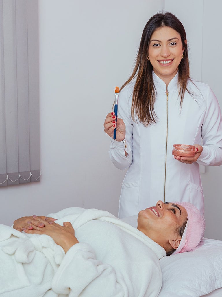 Aesthetician in a spa with a client