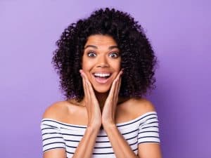 Surprised woman illustrating common myths about cleaning, sanitizing and disinfecting