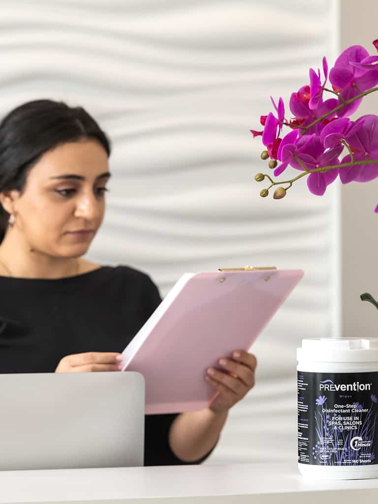 Beauty school student with Prevention Wipes